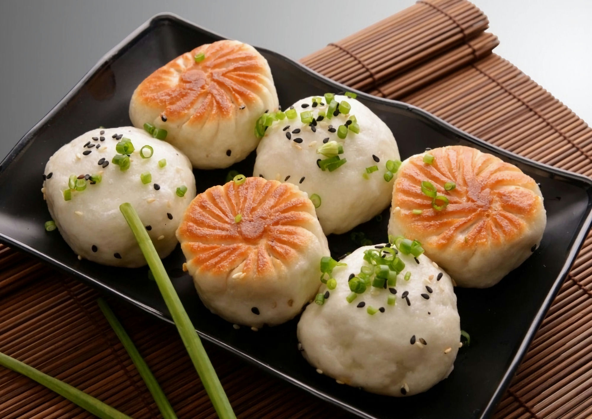 Exploring the Crispy and Juicy Delight of Chinese Sheng Jian Bao